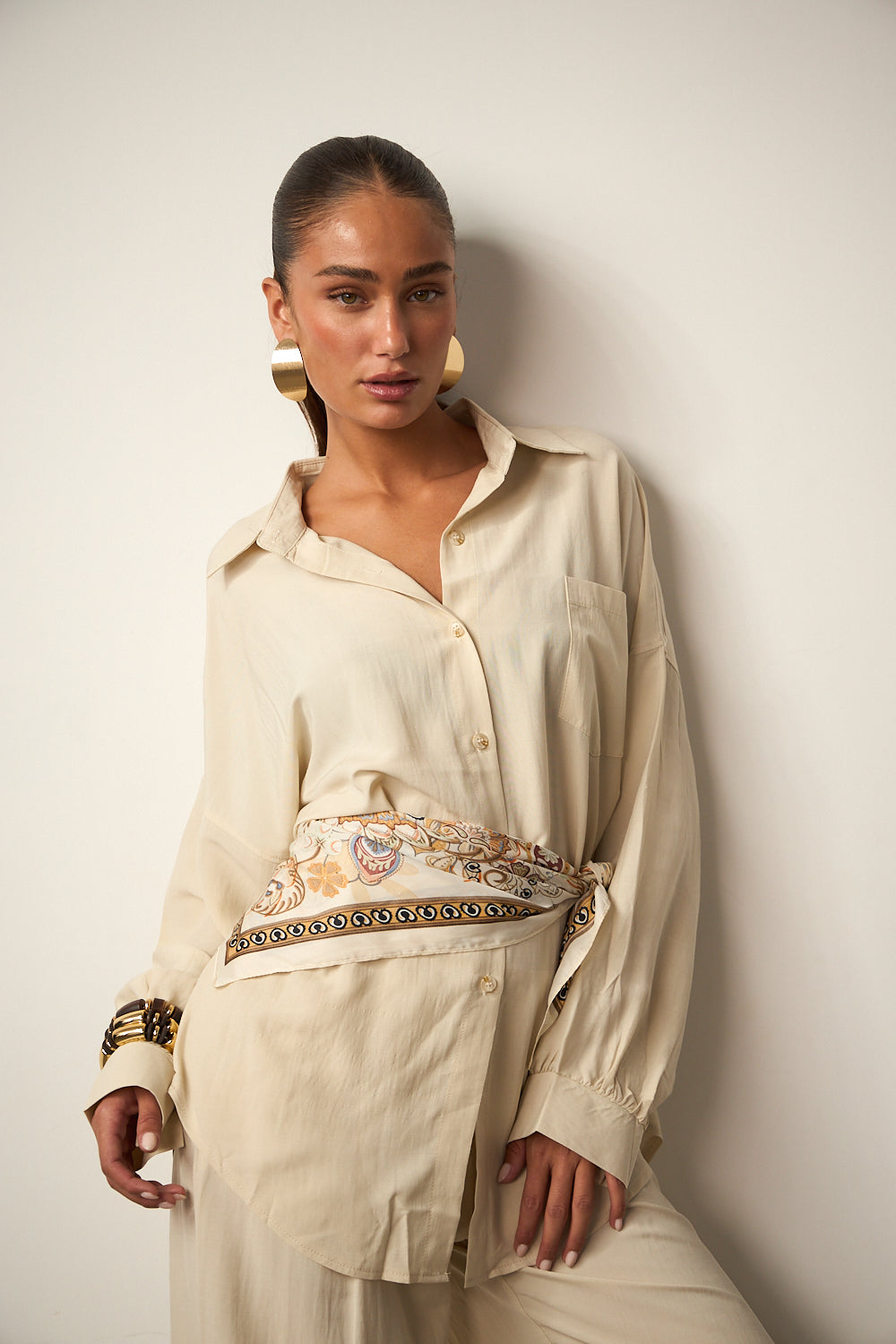 מכופתרת זואי