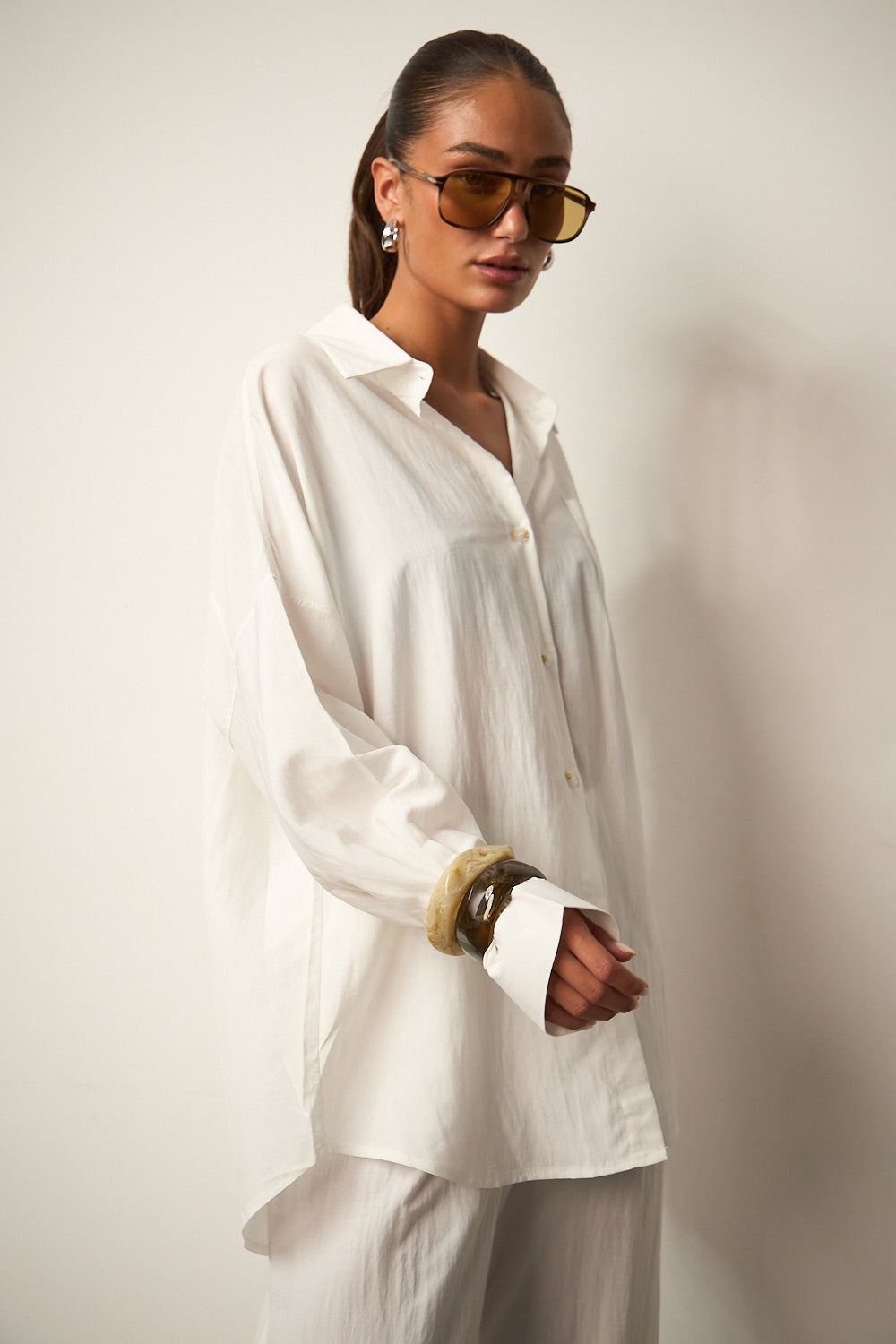 מכופתרת זואי