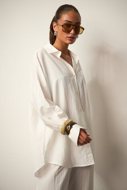 מכופתרת זואי