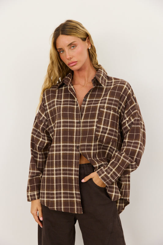 מכופתרת סואן