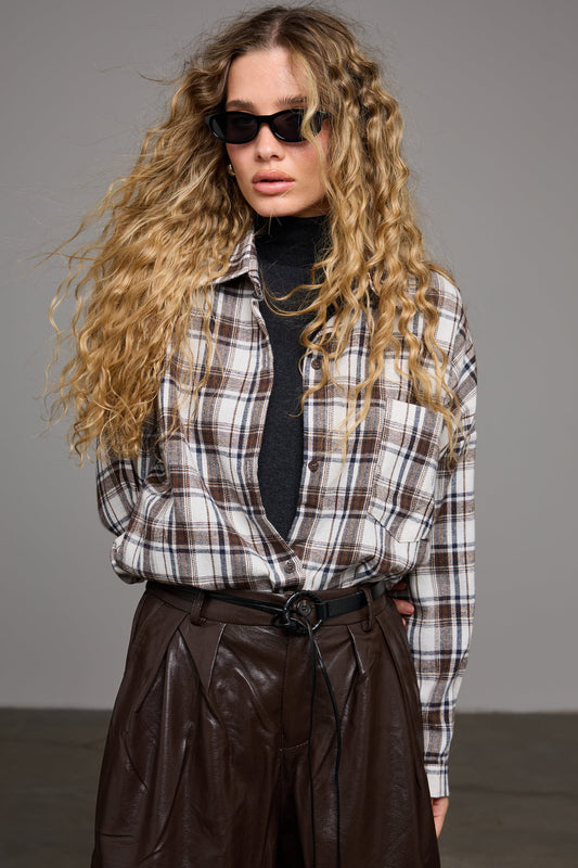 מכופתרת סואן