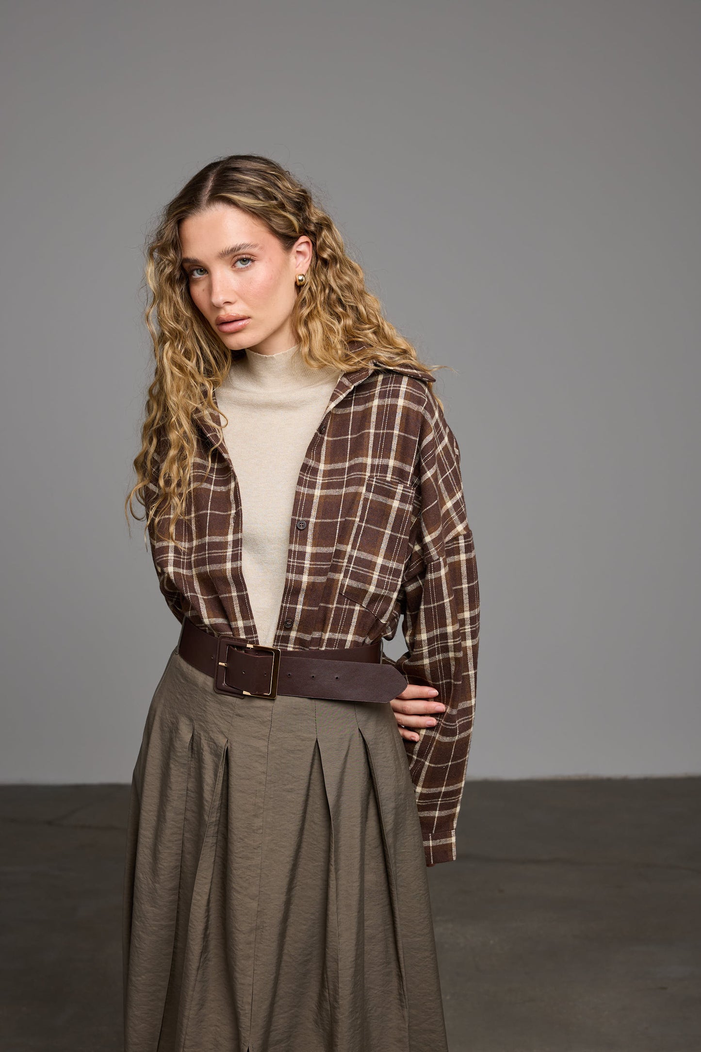 מכופתרת סואן