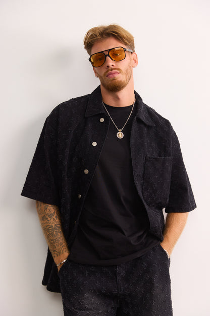 מכופתרת דנאל