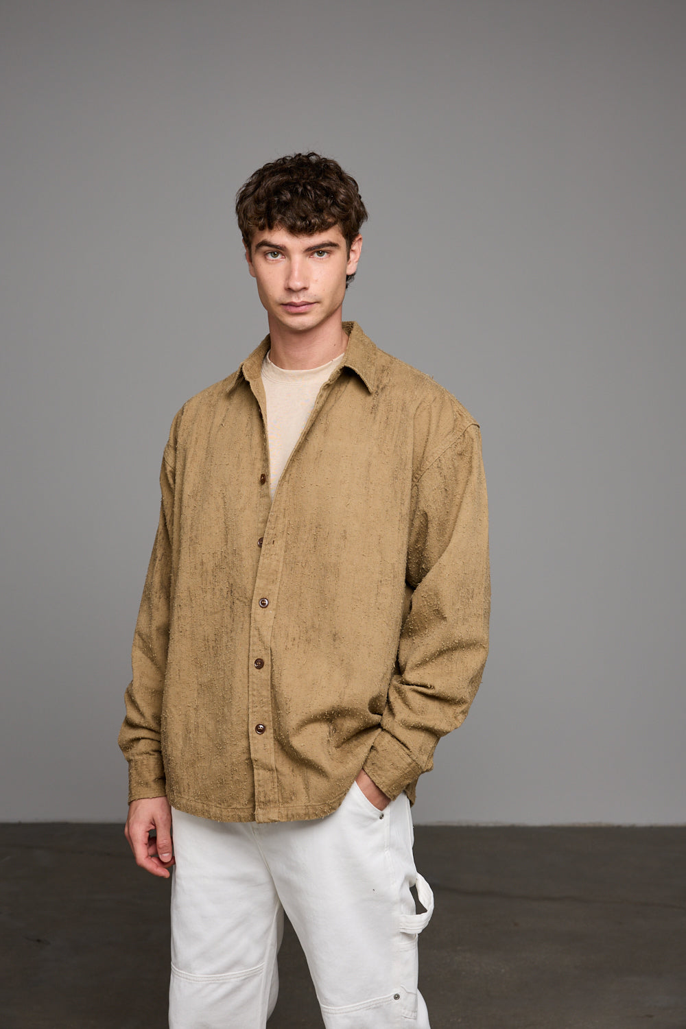 מכופתרת דורי