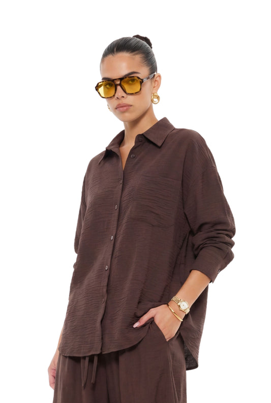 מכופתרת דניס