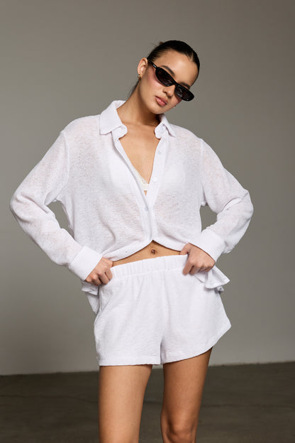 מכופתרת נדין